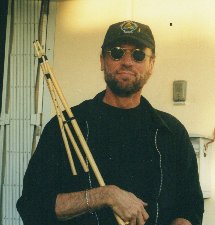 With Launeddas (215Wx225H) - Maurice holding the Sardinian musical instrument 